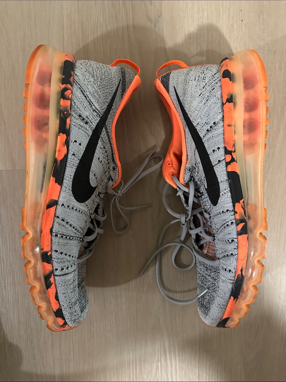 Nike Men’s Flyknit Sneakers in Gray and Bright Orange